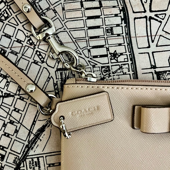 Coach Wristlet with bow Color: Sand/tan 6.25"W x 4.25"H x .25 D - Picture 3 of 6